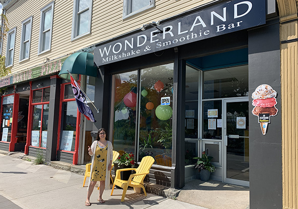 Wonderland Milkshake & Smoothie Bar storefront along a downtown street.